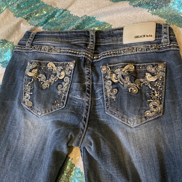 LA GRACE size 30 bootcut light wear on the bottom cuffs shown. - Picture 2 of 5